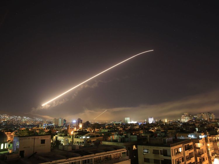 The Damascus sky lights up with surface-to-air missile fire