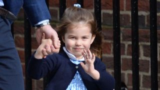 Charlotte waved as she arrived to meet her baby brother