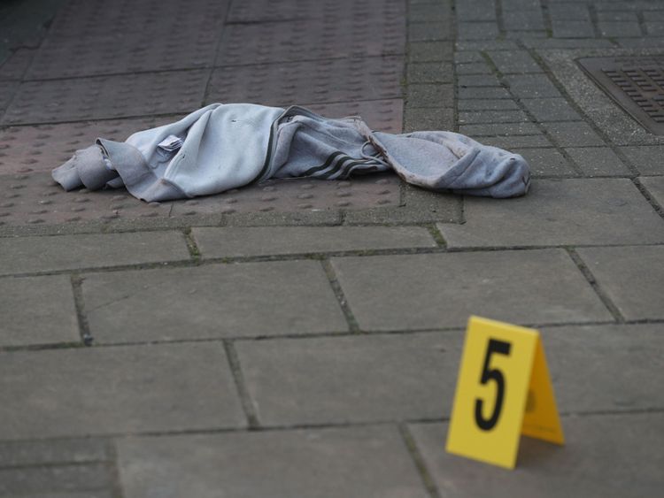 A hooded top was left on the pavement near one of the crime scenes