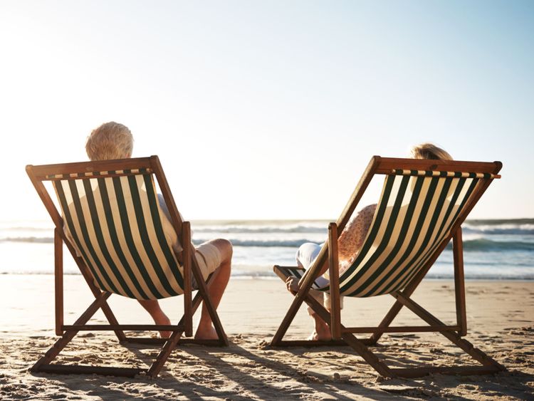 Pensioners enjoying the beach