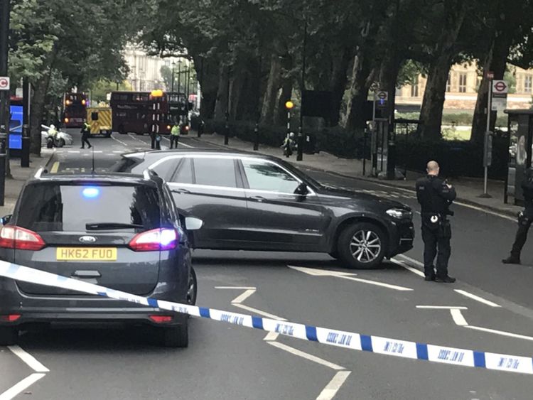 Police vehicles in Westminster after a vehicle crashes into the Houses of Parliament