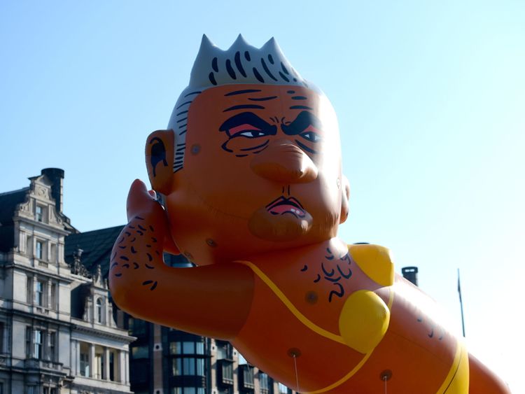 A giant balloon of London Mayor Sadiq Khan dressed in a bikini moments before it is launched