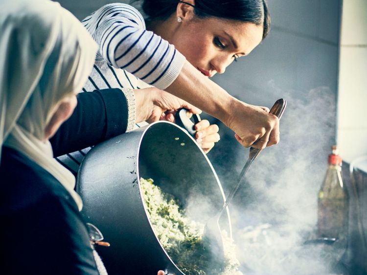The Duchess of Sussex has spent time cooking with women in the Hubb Community Kitchen. Pic: Jenny Zarins