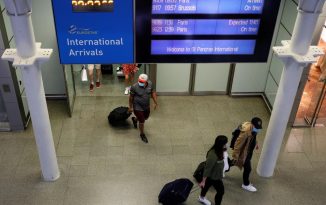 Britons rush home from France to beat new quarantine rules