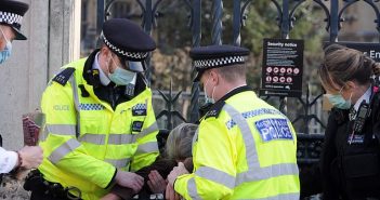 Tory MP Sir Charles Walker rages at police as they bundle spread-eagled elderly woman into a van