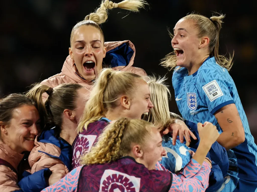 Alessia Russo is engulfed by teammates after scoring England’s third goal against Australia. Photograph: Steve Christo/AFP/Getty Images